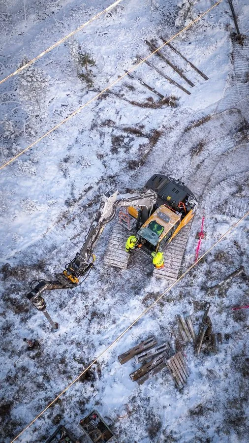 Helical pile installation with excavator-mounted drive head